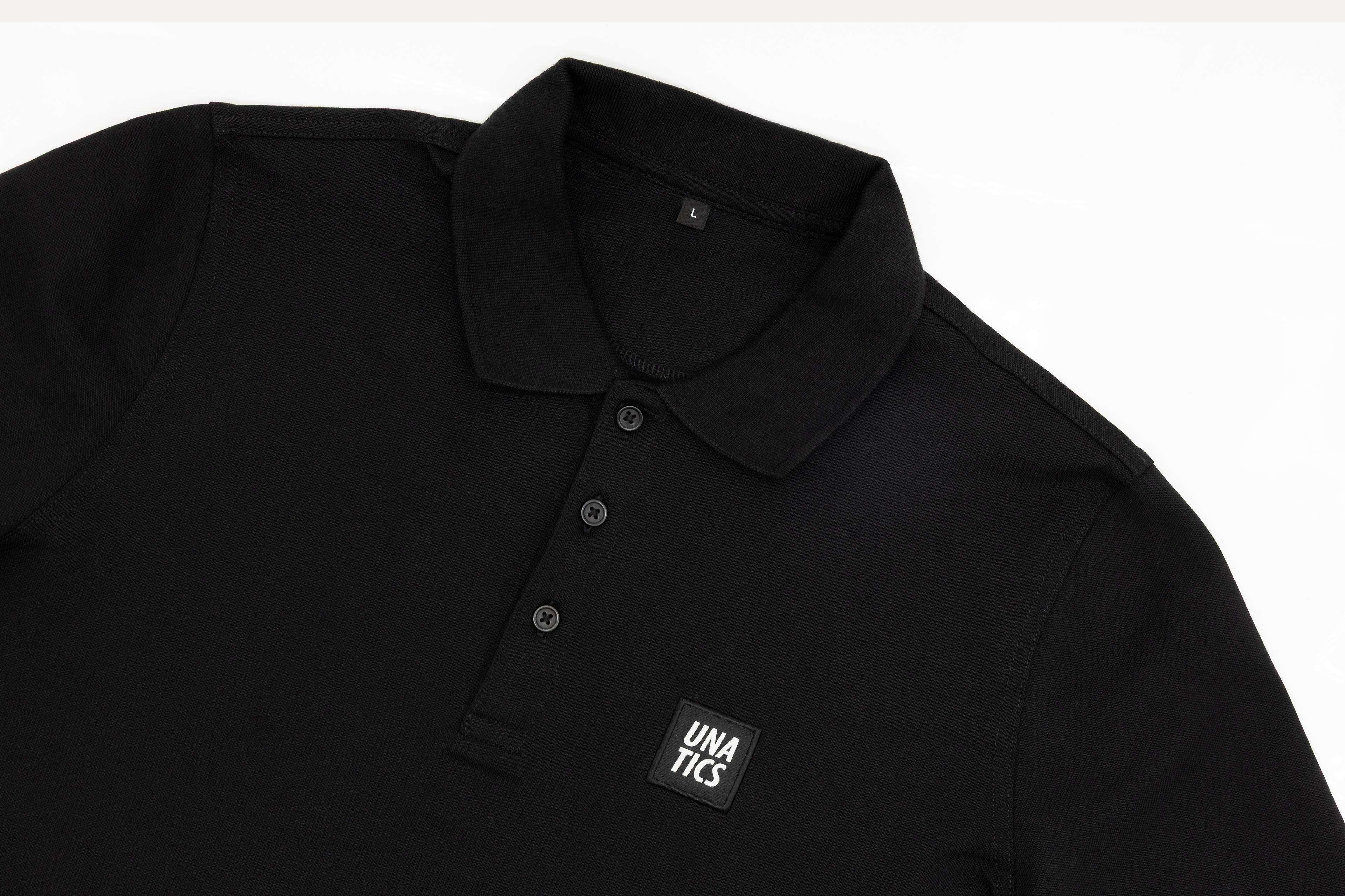 Poloshirt 'Brandlabel' black
